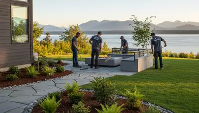 Seattle, WA landscaping service team maintaining a residential yard with professional outdoor care tools
